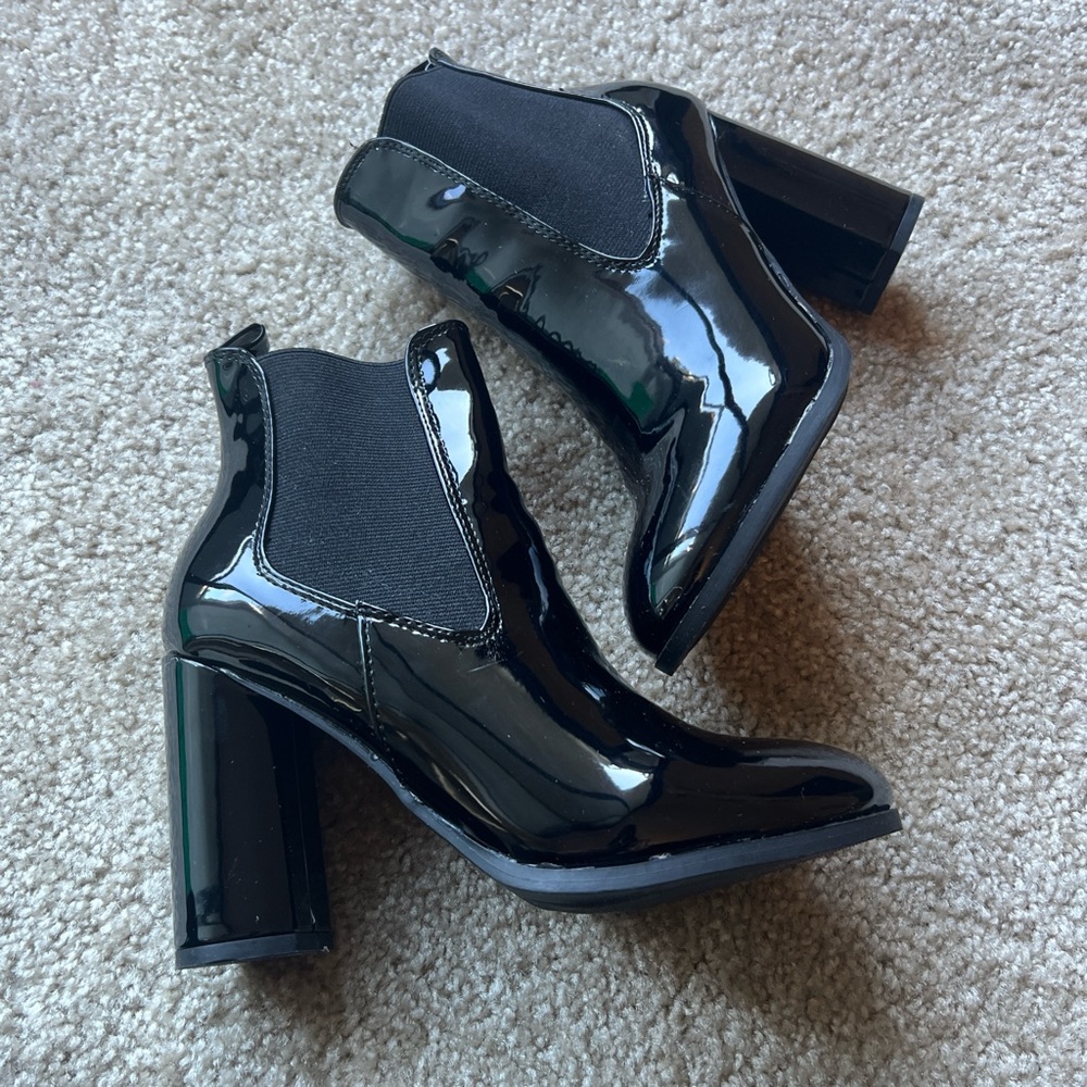 Shiny high heel boots